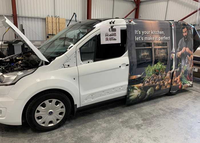 High Resolution Printed Vehicle Graphics being applied to white works van