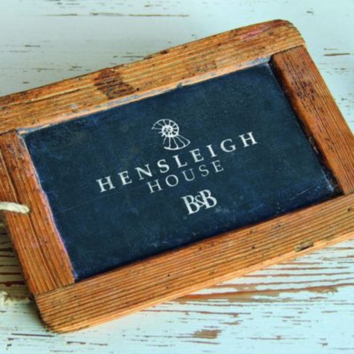 Logo Design Concepts for Hensleigh House on Chalk Board.jpg