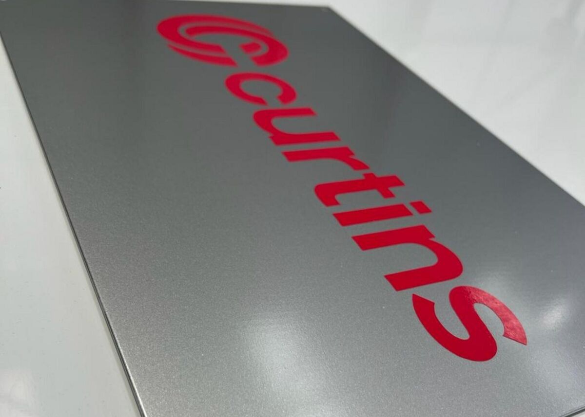 aluminium-wall-sign-red-lettering-branding-in-vinyl-applied-to-face.jpg