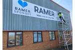 Installing new large ACM panel sign for Ramer Ltd.jpg