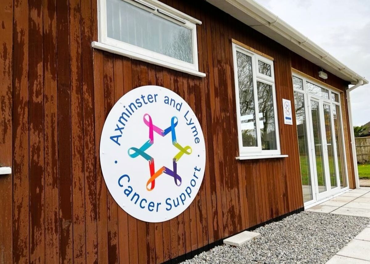 Axminster &amp; Lyme Cancer Support New Location in Axminster ACM Signage.jpg