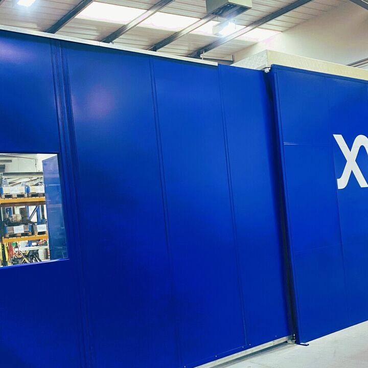 Cut Vinyl White Self-Adhesive Wall Graphic on Blue Metal Wall.jpg