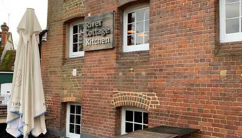 Installing new signs at The River Cottage