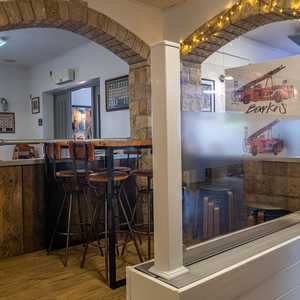 Corner in Martin's Bar featuring COVID protective screens