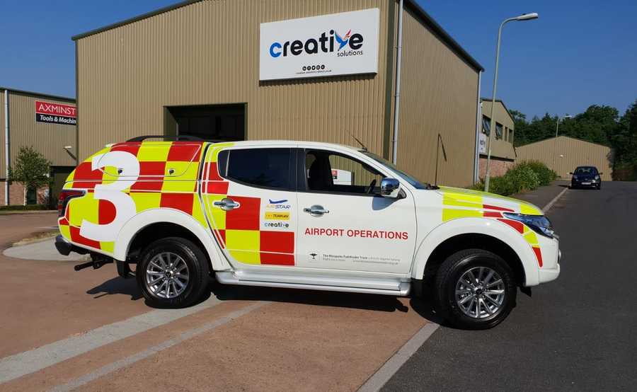 Pick up Truck with reflective vehicle graphics