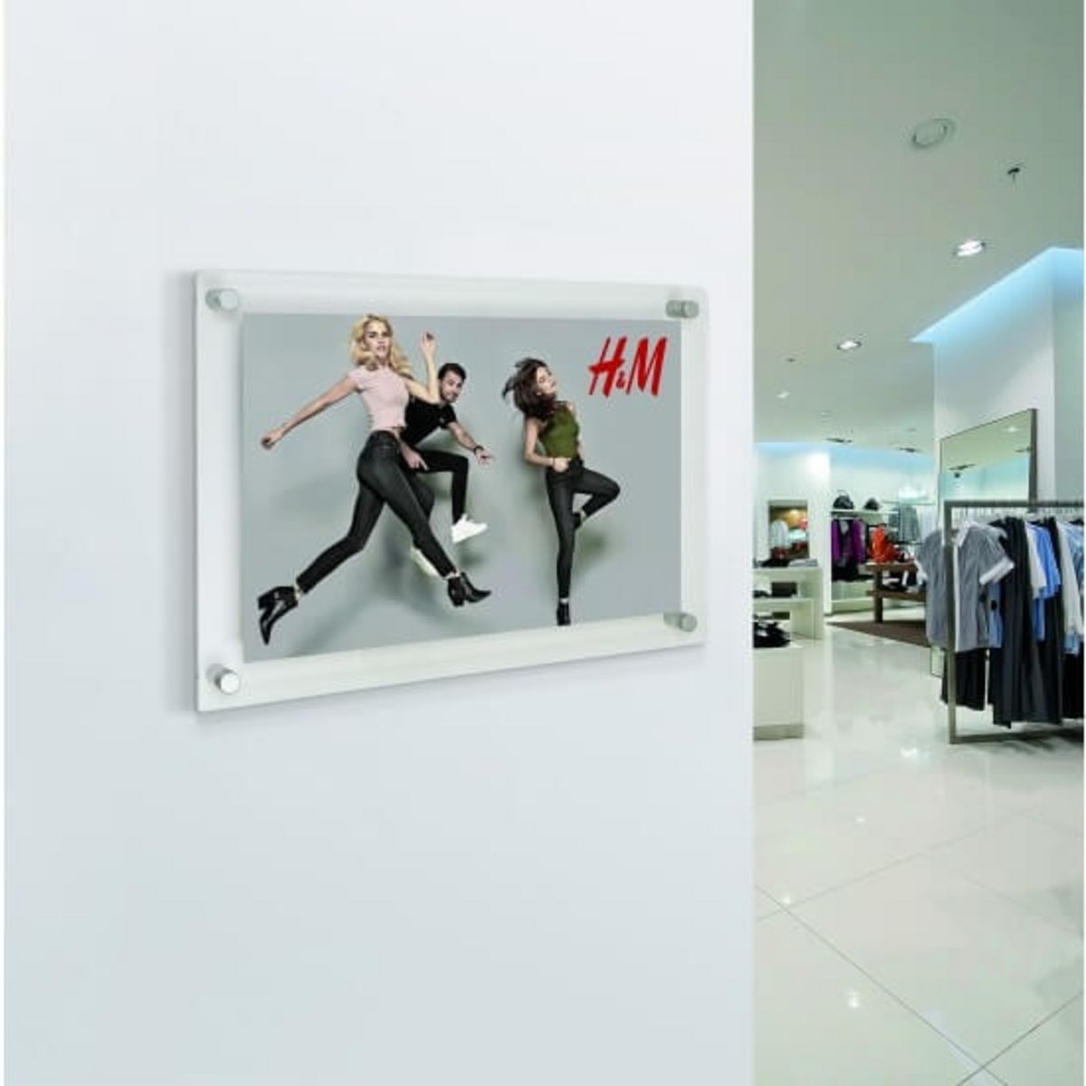 Acrylic frames wall mounted for retail.jpg