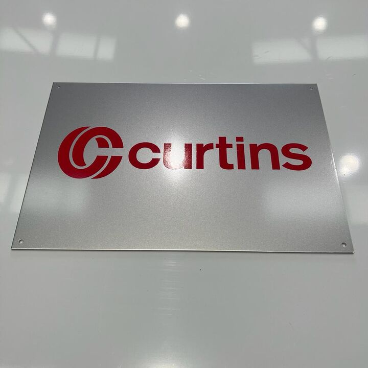 Aluminium Wall Sign - Bright Red lettering branding in vinyl applied to face.jpg