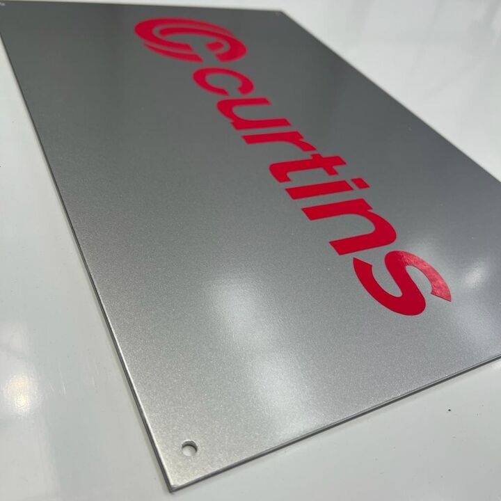 Aluminium Wall Sign - Red lettering branding in vinyl applied to face.jpg