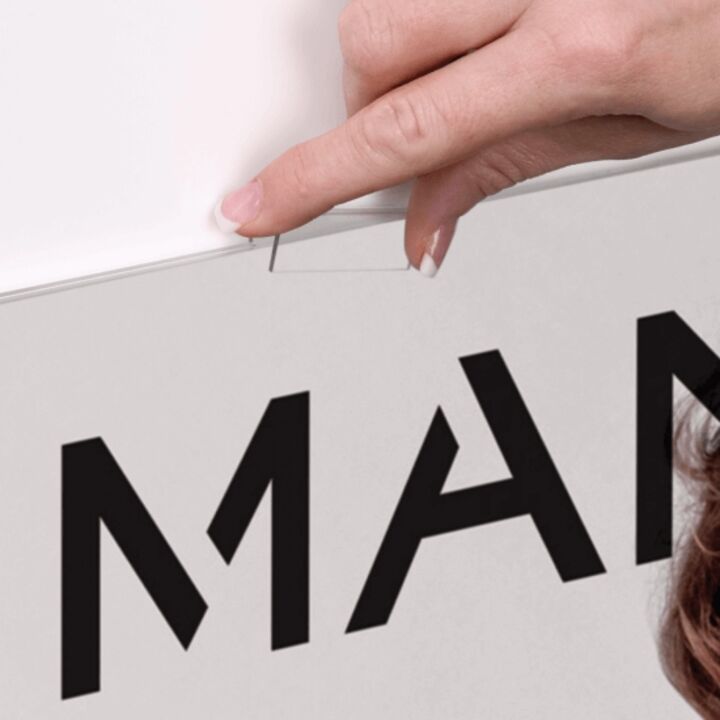 An acrylic poster holder makes changing your graphics easy.png