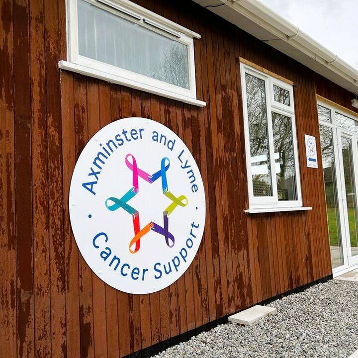 Axminster &amp; Lyme Cancer Support New Location in Axminster ACM Signage.jpg