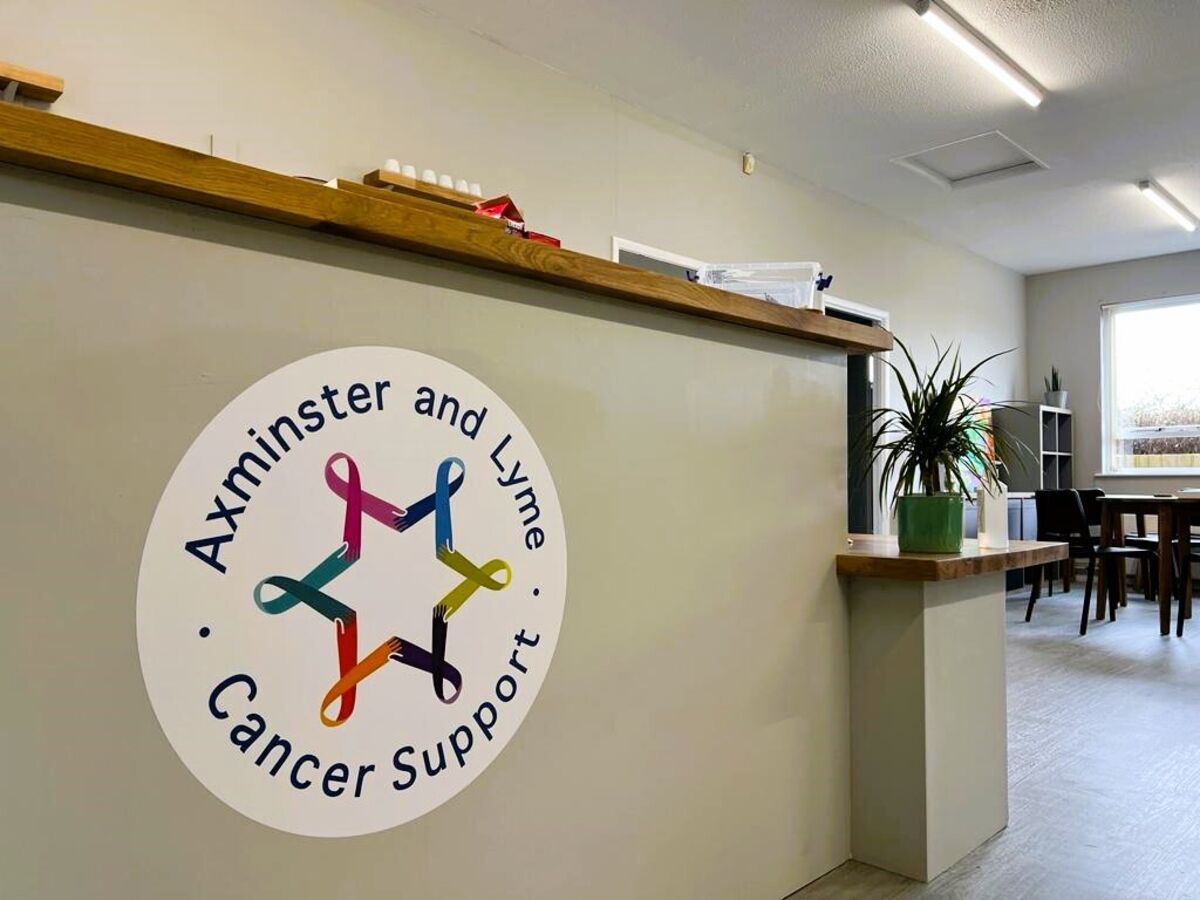 Axminster & Lyme Cancer Support New Locations Signage Desk Sign.jpg