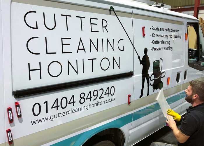Large text vehicle graphics and imagery on works van