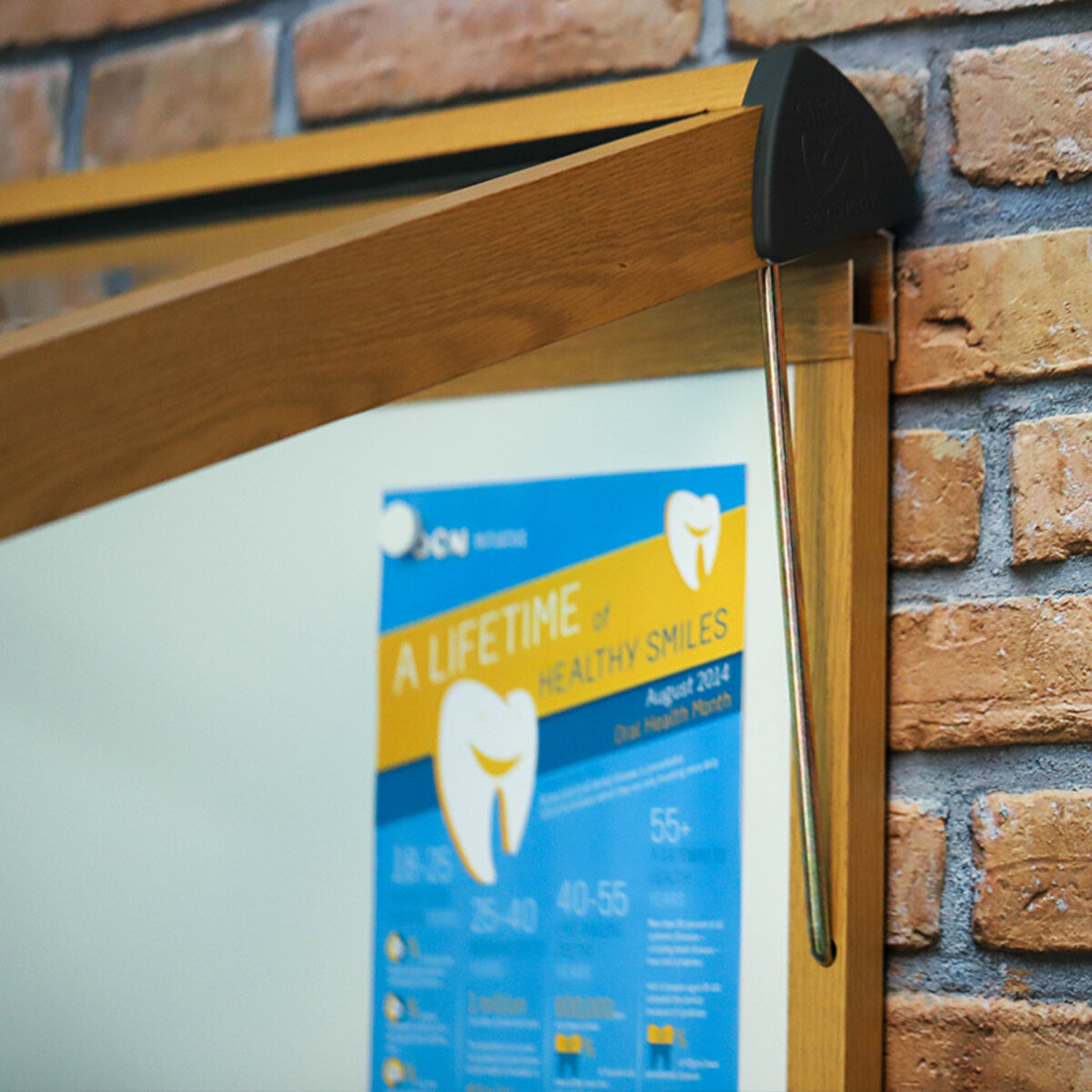 Close up Shield Showcase whiteboard oak frame.jpg