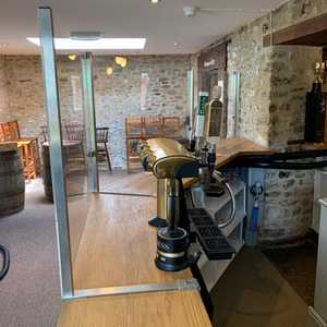 Curved Acrylic Screens with Clamp Mounting for Pub