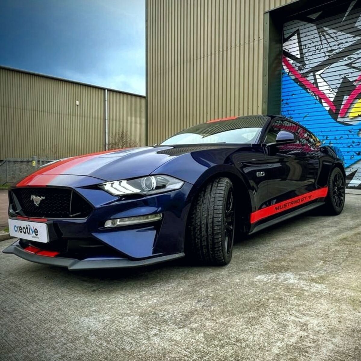 Custom Gloss Red Stripes on Dark Blue Mustang GT - Passenger Side View.jpg