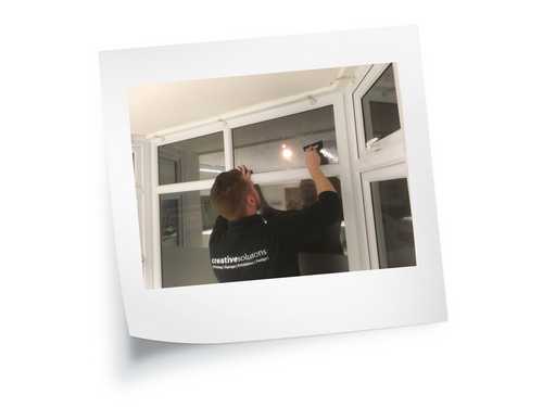 Lyme Bay Holidays Window Graphics Installation Lyme Bay Holidays Window Graphics Installation