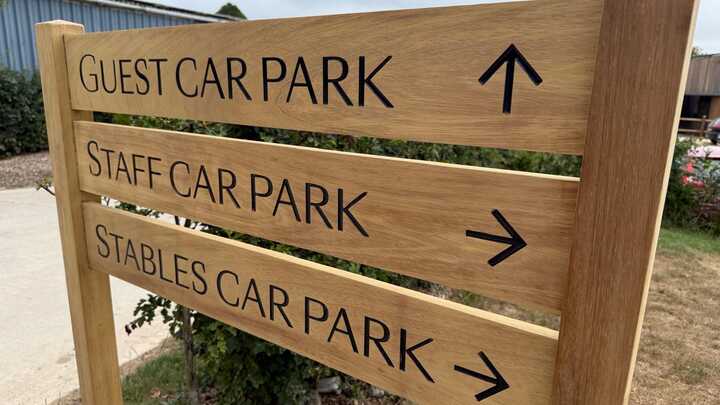 Bespoke Wooden Wayfinding Signage & Colour-Matched Vehicle Wrap for Louma Country Hotel (Dorset)