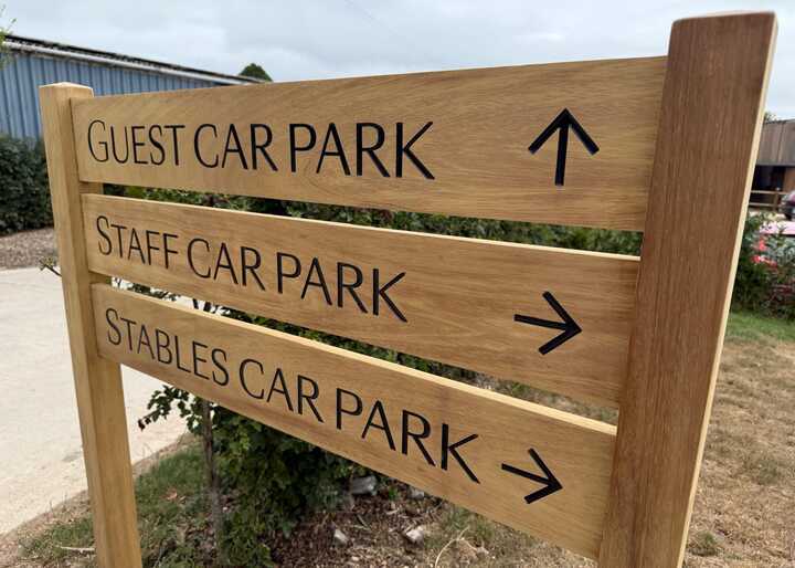 Bespoke Wooden Wayfinding Signage & Colour-Matched Vehicle Wrap for Louma Country Hotel (Dorset)