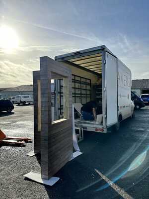 Carefully Unloading Custom Stand Unit Custom Trade Show Stand for Heavers of Bridport - Carefully Unloading Custom Stand Unit