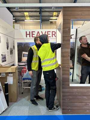 Custom Trade Show Stand for Heavers of Bridport - Fixing Custom Unit Into 3x3 Exhibition Booth
