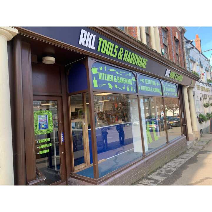 Storefront of RKL Tools & Hardware, featuring large windows and signage.