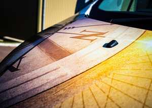 Close up of nautical compass in sunset colours on VW Transporter bonnet - created and printed by Creative Solutions