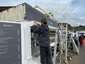 Removing the old signage vinyl
