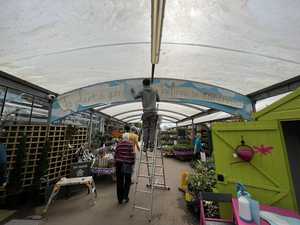 4. Applying the lettering backing sheet to the panel and activating the adhesive