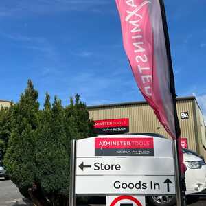 Completed Vinyl Installation in-situ on external signage for Axminster Tools Completed Vinyl Installation in-situ on external signage for Axminster Tools
