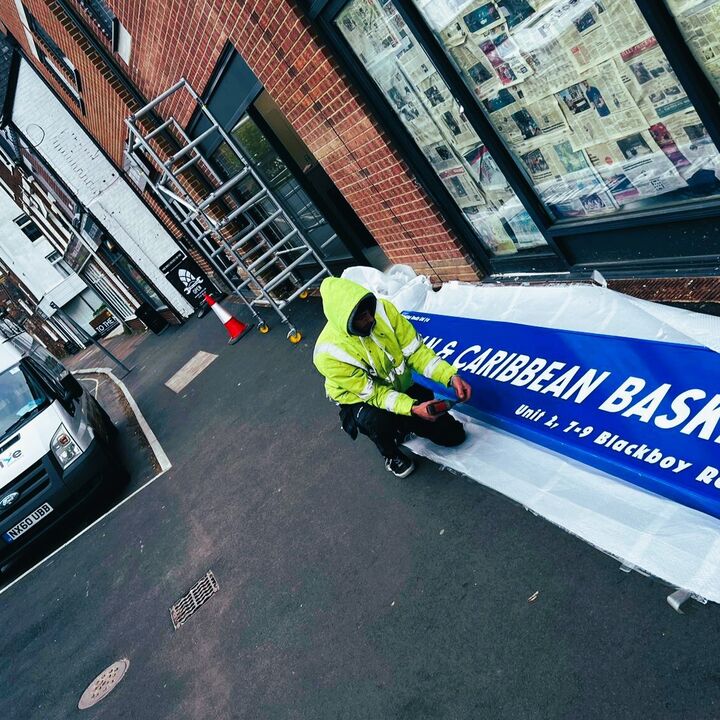 Installing 4 Meter Lightbox Fascia Sign for African &amp; Caribbean Basket 1.jpg