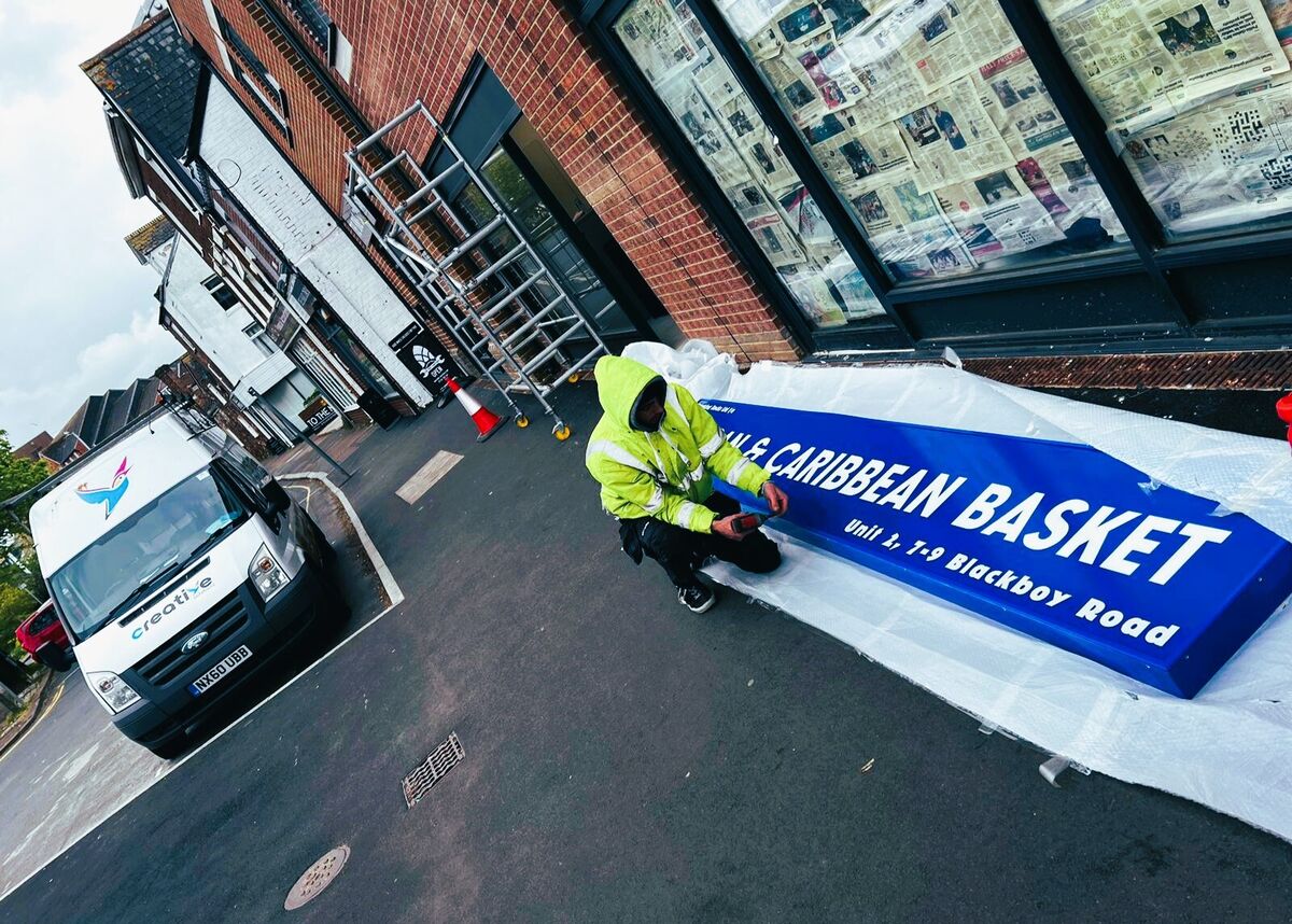 Installing 4 Meter Lightbox Fascia Sign for African & Caribbean Basket 1.jpg