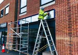 Installing 4 Meter Lightbox Fascia Sign for African & Caribbean Basket