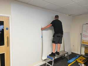 Installing custom cut magnetic roll to the wall Installing custom cut magnetic roll to the wall