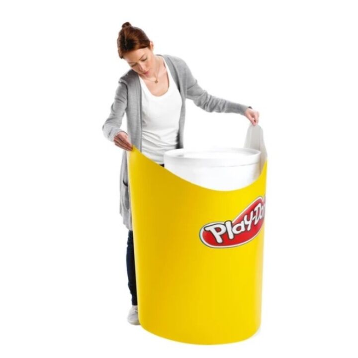 Lady adding Play-Doh graphic to the Swift 360 body panel.jpg