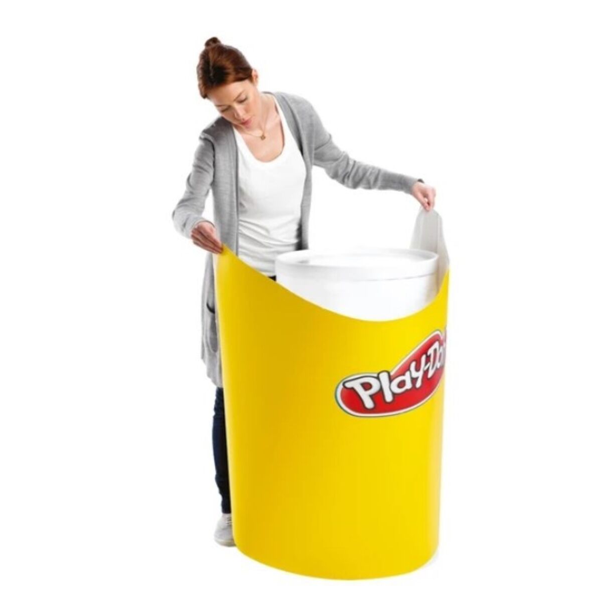 Lady adding Play-Doh graphic to the Swift 360 body panel.jpg