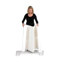 Lady adding the Action body panel to the bottom of the promotional display counter..jpg