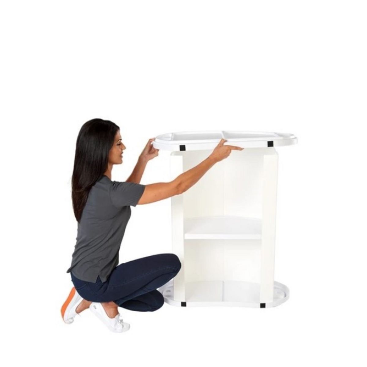Lady adding the inner top to the Finesse2 promotional display counter..jpg