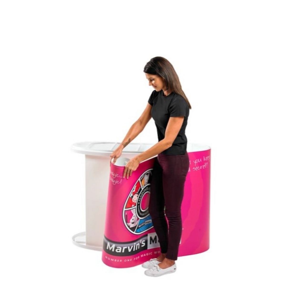 Lady adding the Marvin Magic graphic to the Finesse promotional display counter. 1.jpg