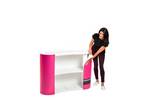 Lady adding the Marvin Magic graphic to the Finesse promotional display counter. 2.jpg
