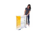 Lady adding the Miles graphic to the Finesse2 promotional display counter..jpg