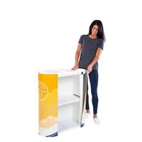 Lady adding the Miles graphic to the Finesse2 promotional display counter..jpg