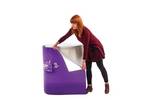 Lady attaching Milka graphic to the Rapido promotional display body panel..jpg