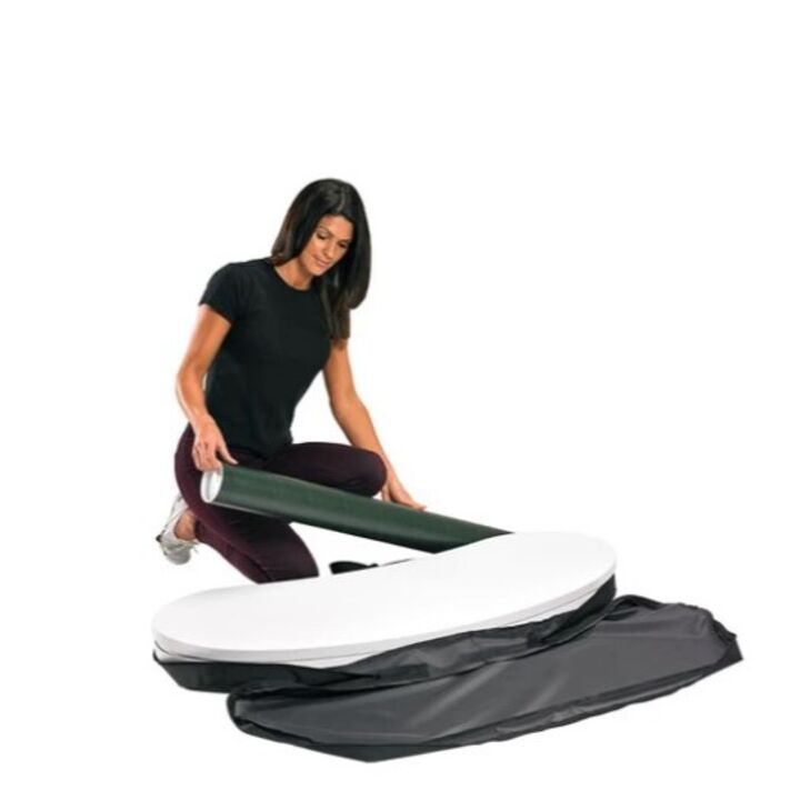 Lady removing the Finesse promotional display counter parts from the carry bag..jpg