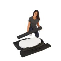 Lady removing the Finesse2 promotional display counter parts from the carry bag.jpg