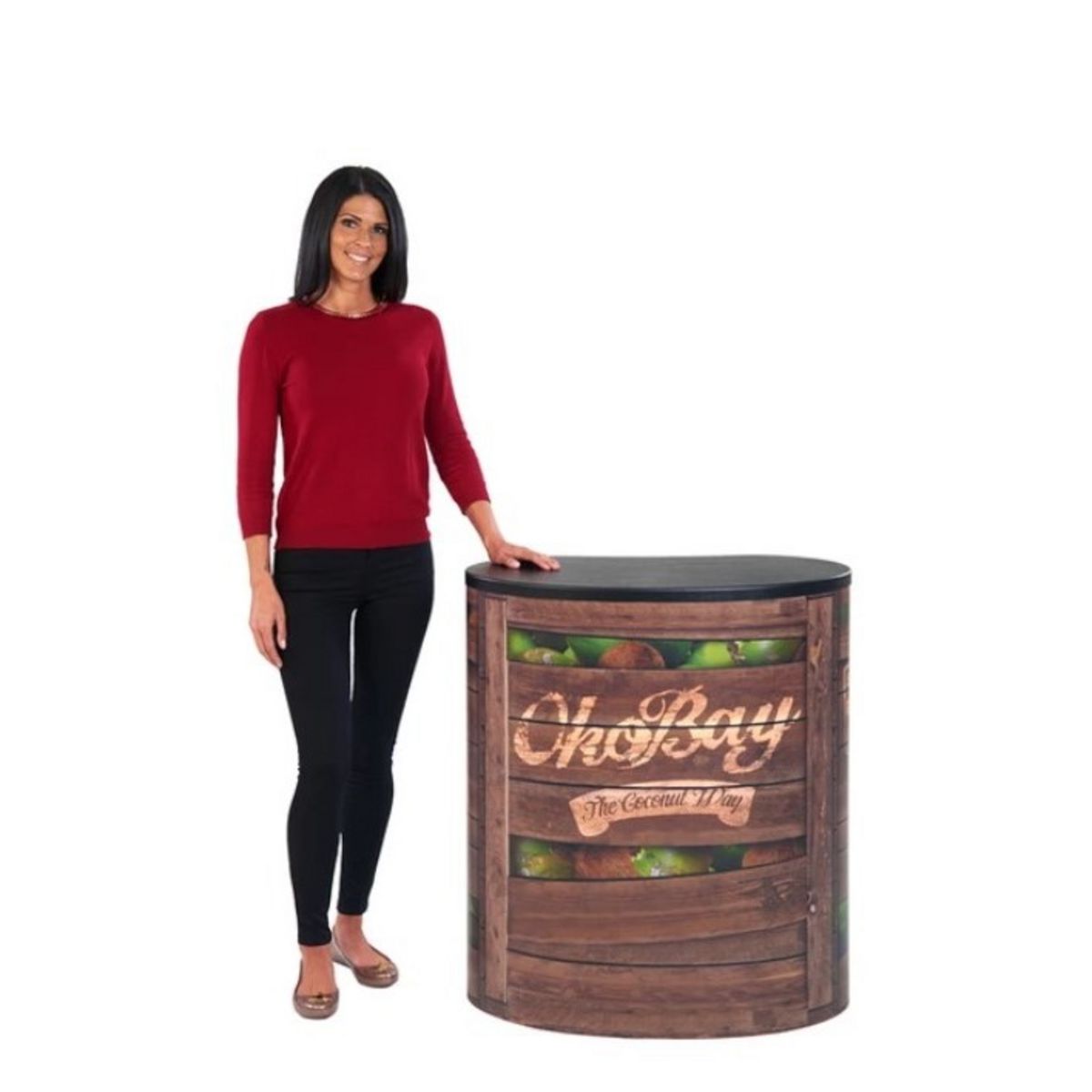 Lady standing next to a compelted Finesse2 promotional display counter with the black leatherette counter top.jpg