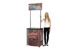 Lady standing next to completed Demo Center promotional display counter..jpg