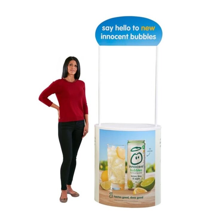 Lady standing next to completed Finesse2 with optional header and poles..jpg