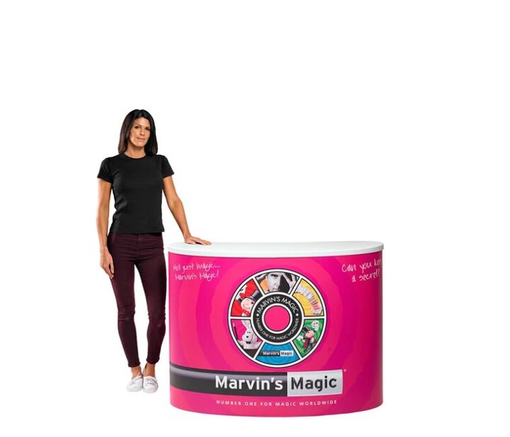 Lady standing next to the completed Finesse promotional display counter..jpg