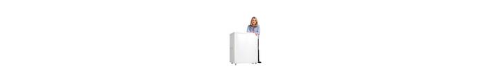 Lady standing next to the Motion promotional display counter with wheels..jpg