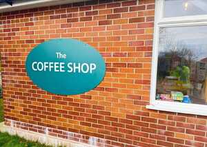 New Wall Mounted ACM Oval Panel Sign at Dalwood Community Shop New Wall Mounted ACM Oval Panel Sign at Dalwood Community Shop
